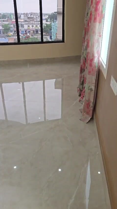 Glossy floor tiles installed at a client project