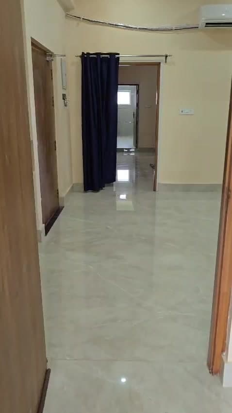 Polished hall floor tiles installed at a client project